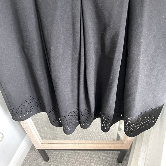 Calvin Klein A line flare black dress with cutout hem detail size 10 - Picture 3 of 5